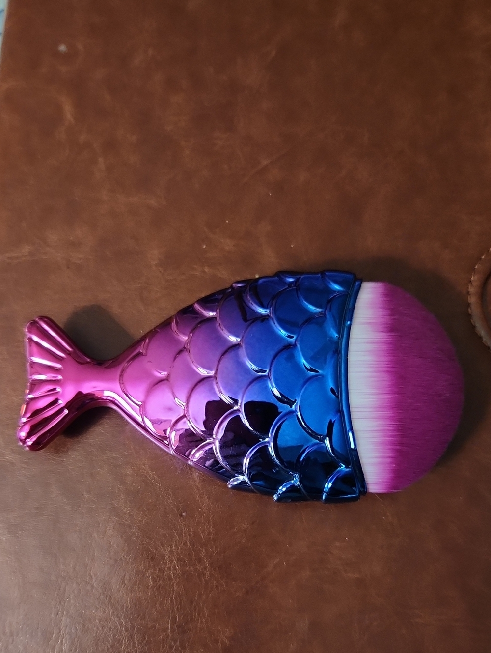 NWT cosmetic brush fish shape, w/plastic protective wrap around cover
